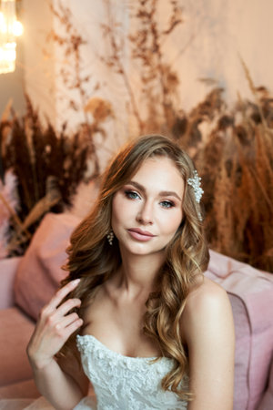 Bride in wedding dress. Young fashion model with perfect skin, make up and Beautiful Hairstyle. Happy day. Marriage.の写真素材