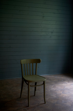 Wooden chair in an empty room, loneliness and minimalism. Room d cor.の写真素材