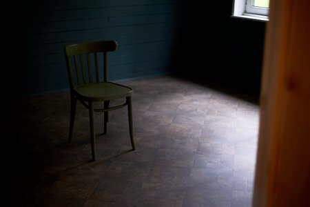 Wooden chair in an empty room, loneliness and minimalism. Room d cor.の写真素材
