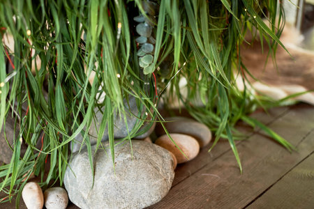 Large stones in the d cor on the open veranda, terrace board. Outdoor designの写真素材