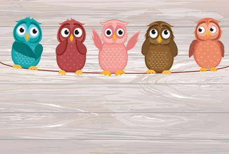 Five cute colored owlet sitting on a rope. A red hearts with a picture hanging on a rope.  Valentine's Day. Vector illustration on wooden background. Greeting card with empty space for the label or advertisingのイラスト素材