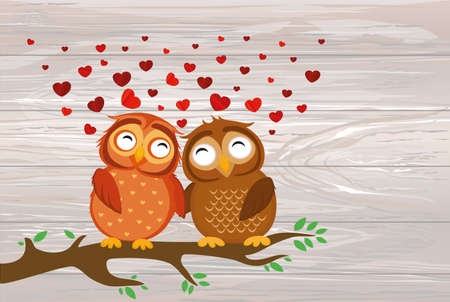 A pair of cute owlet sitting on a branch. Owls in love hearts around them. Greeting card for Valentine's Day. Vector illustration on wooden back.のイラスト素材