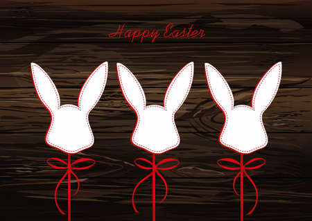 Paper easter bunny. Head of a rabbit on a stick with a bow and ribbon. Empty place for text or advertising. Greeting card or invitation for a holiday. Vector on wooden background.のイラスト素材
