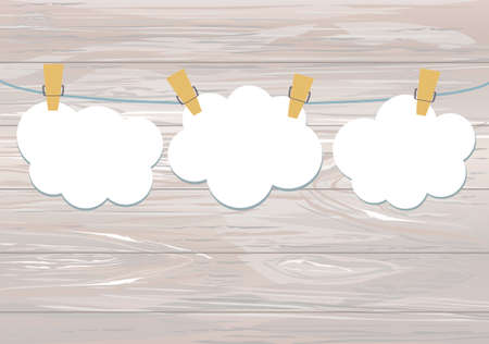 White clouds of paper hang on a rope with clothespins on the wooden background. Vector. Free space for text or advertising.のイラスト素材
