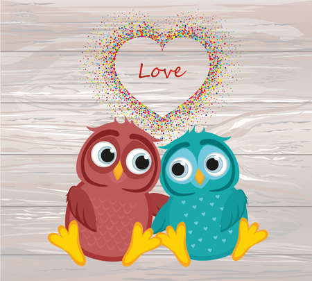 A pair of cute owls in love. Vector on wooden background. Colorful confetti in the form of heart. Greeting card or invitation for St. Valentine's Day or a holiday.のイラスト素材