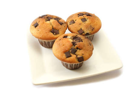 Orange and chocolate flavoured muffins with choc chip piecesの写真素材