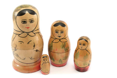 Very old, faded Russian dolls with the baby nestling next to Motherの写真素材