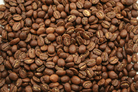 Mild aromatic Kenyan coffee beans for use as a background or wallpaper perhaps?の写真素材
