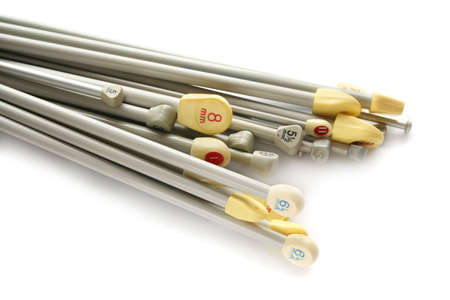 variety of knitting needles in different sizes - both European millimetres and UK sizesの写真素材