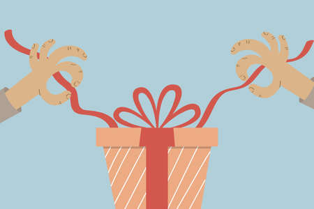 A pair of human hands unwrapping a present.のイラスト素材