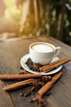 Composition with white cup of coffeeの写真素材