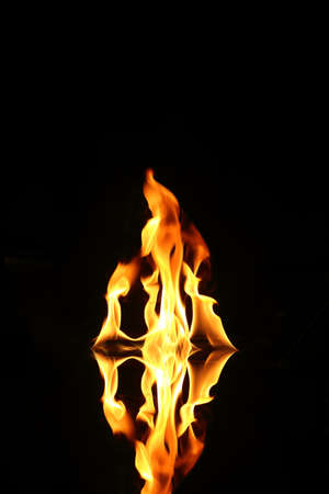 Flame of fire in a night-timeの写真素材