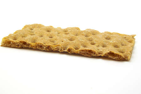 Crispybread from Rye flour, it is very porous. Isolated on a white background.の写真素材