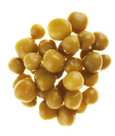 A handful of canned peas. Taken against the light. Isolated on white background.の写真素材