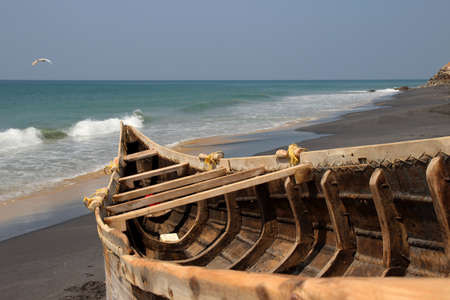 Fishing boat on the Adayam beach, Kerala, Indiaの写真素材