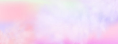 Abstract blurred pastel gradient background with pink, purple and blue colors.