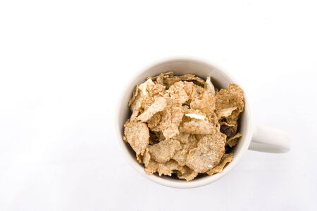 Cup  full of musli and dried fruits 