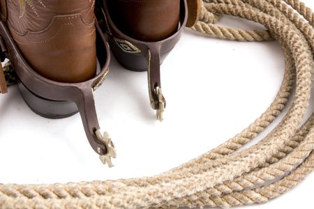 Cowboy gear - western riding equipment, spurs and ropeの写真素材