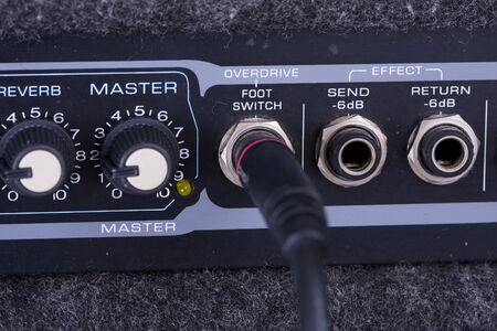 Knobs on a guitar amplifierの写真素材