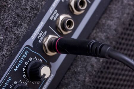 Knobs on a guitar amplifierの写真素材