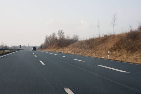 Highway at day, view from the carの写真素材