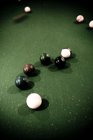 Vintage billard balls on green tableの写真素材