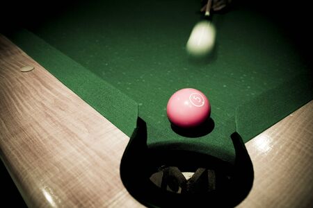 Vintage billard balls on green tableの写真素材