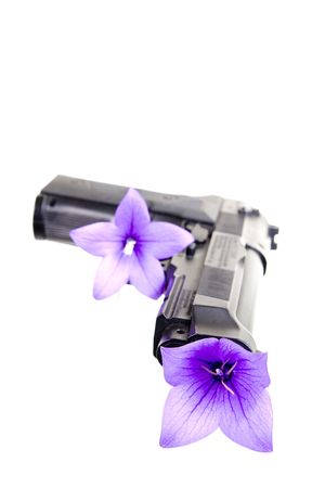  gun and flower on a white backgroundの写真素材
