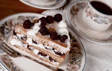 Raspberry cake served with  teaの写真素材