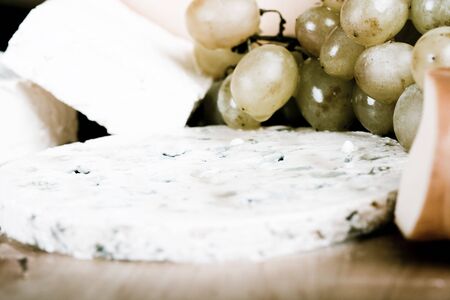Cheese and grapes close-up compositionの写真素材