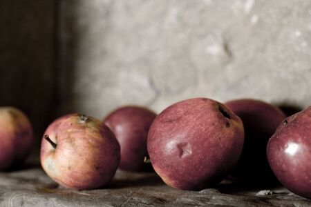 Apples still life on stone の写真素材