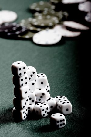 Playing cubes on green table