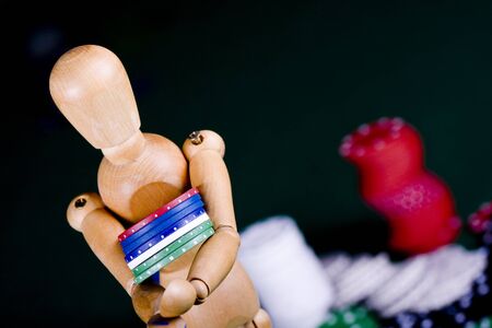  Casino gambling chips on green tableの写真素材