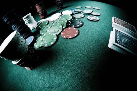  Casino gambling chips on green tableのeditorial素材