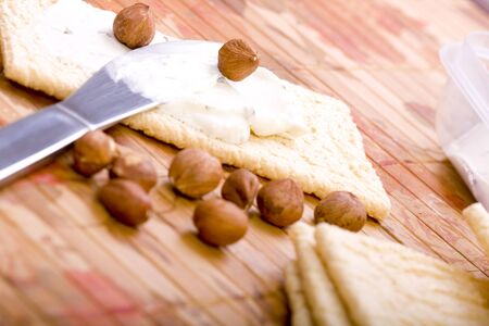 Healthy breakfest with cottage cheese and nuts on crispbread の写真素材