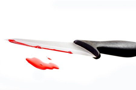Knife and blood on white background