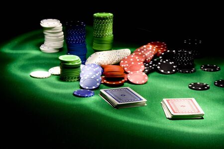  Casino gambling chips on green tableのeditorial素材