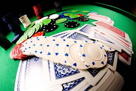  Casino gambling chips on green tableのeditorial素材