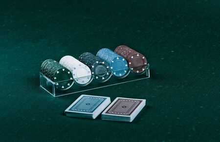  Casino gambling chips on green tableのeditorial素材