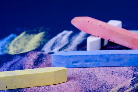 Colorful chalk on the school boardの写真素材