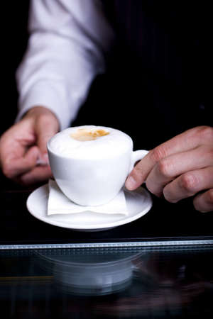 cappuccino cafe served in a restaurantの写真素材