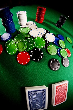  Casino gambling chips on green tableのeditorial素材