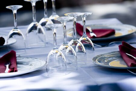 Dishware prepared for dinner in restaurant