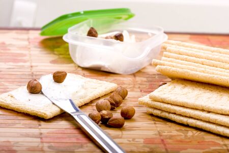 Healthy breakfast  with cottage cheese and nuts on crispbread の写真素材