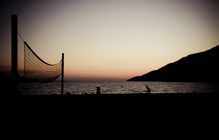 Volleyball net  on Croatian beach with sea in backgroundの写真素材