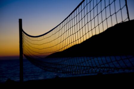 Volleyball net  on Croatian beach with sea in backgroundの写真素材