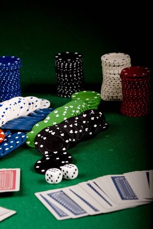  Casino gambling chips on green tableの写真素材