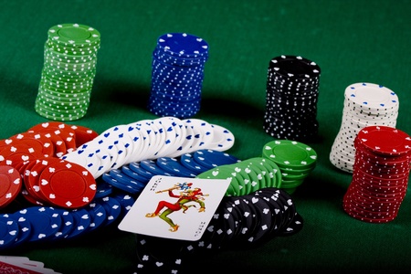  Casino gambling chips on green tableのeditorial素材