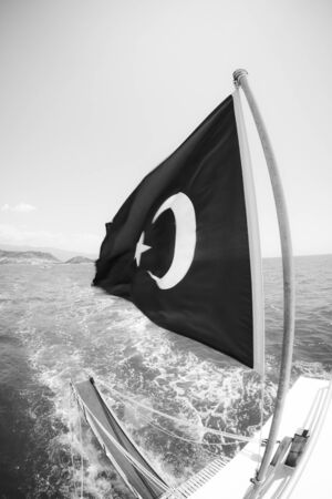 Red Turkish flag on the boatの写真素材