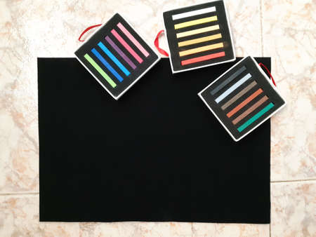 Colorful pastel sticks in boxes for kids creativity, education, art classes